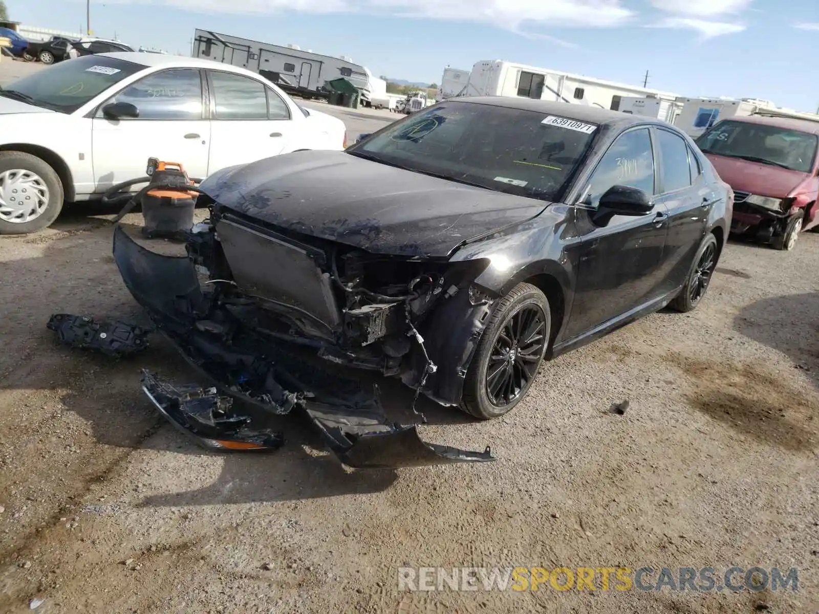 2 Photograph of a damaged car 4T1B11HK6KU275011 TOYOTA CAMRY 2019