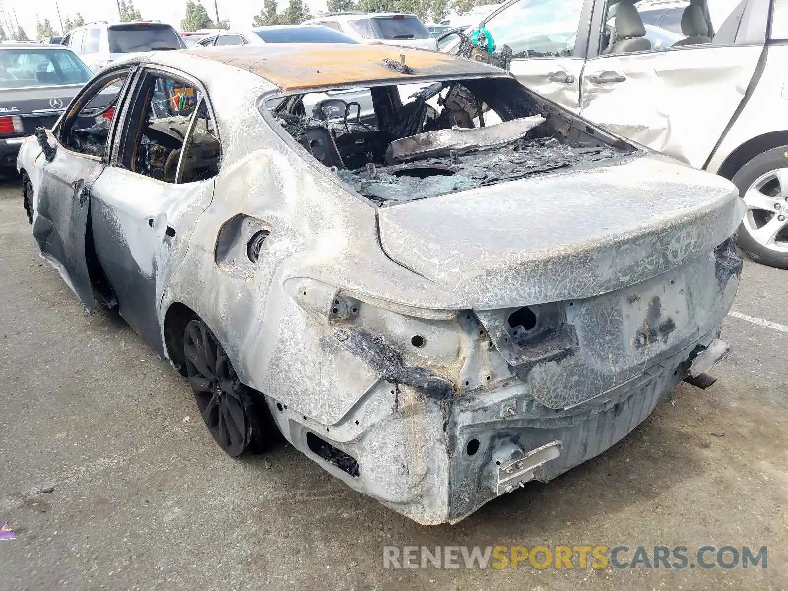 3 Photograph of a damaged car 4T1B11HK6KU277390 TOYOTA CAMRY 2019