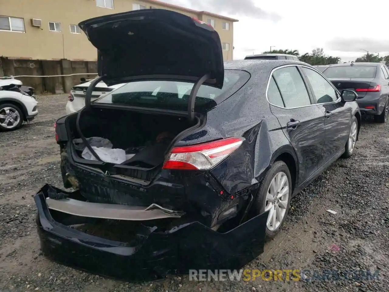 4 Photograph of a damaged car 4T1B11HK6KU281097 TOYOTA CAMRY 2019