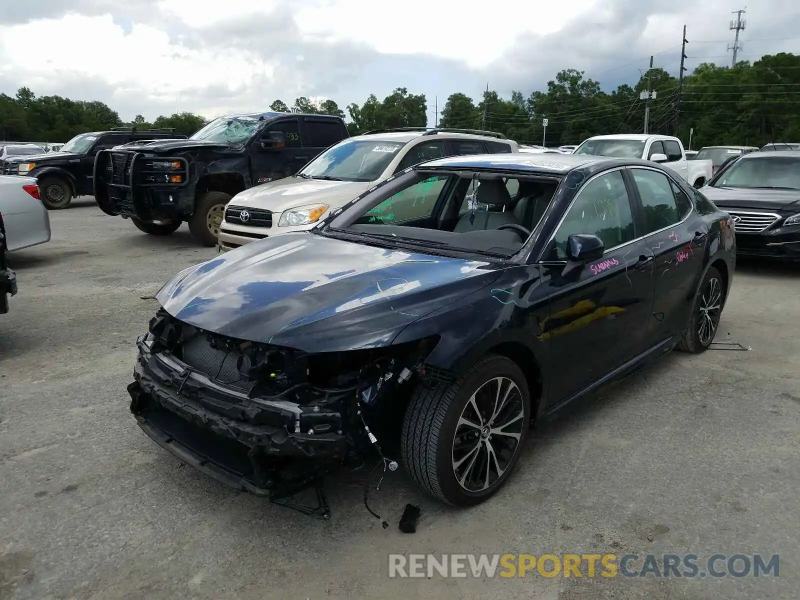 2 Photograph of a damaged car 4T1B11HK6KU282430 TOYOTA CAMRY 2019