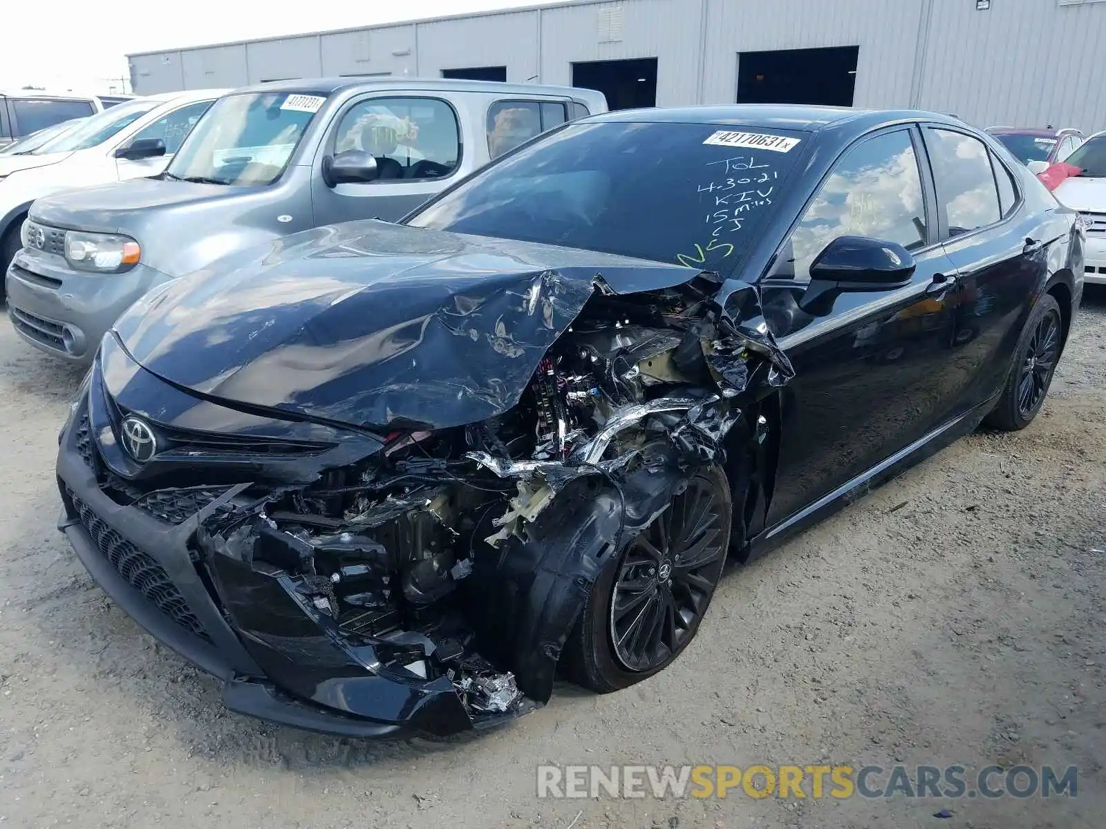 2 Photograph of a damaged car 4T1B11HK6KU289037 TOYOTA CAMRY 2019