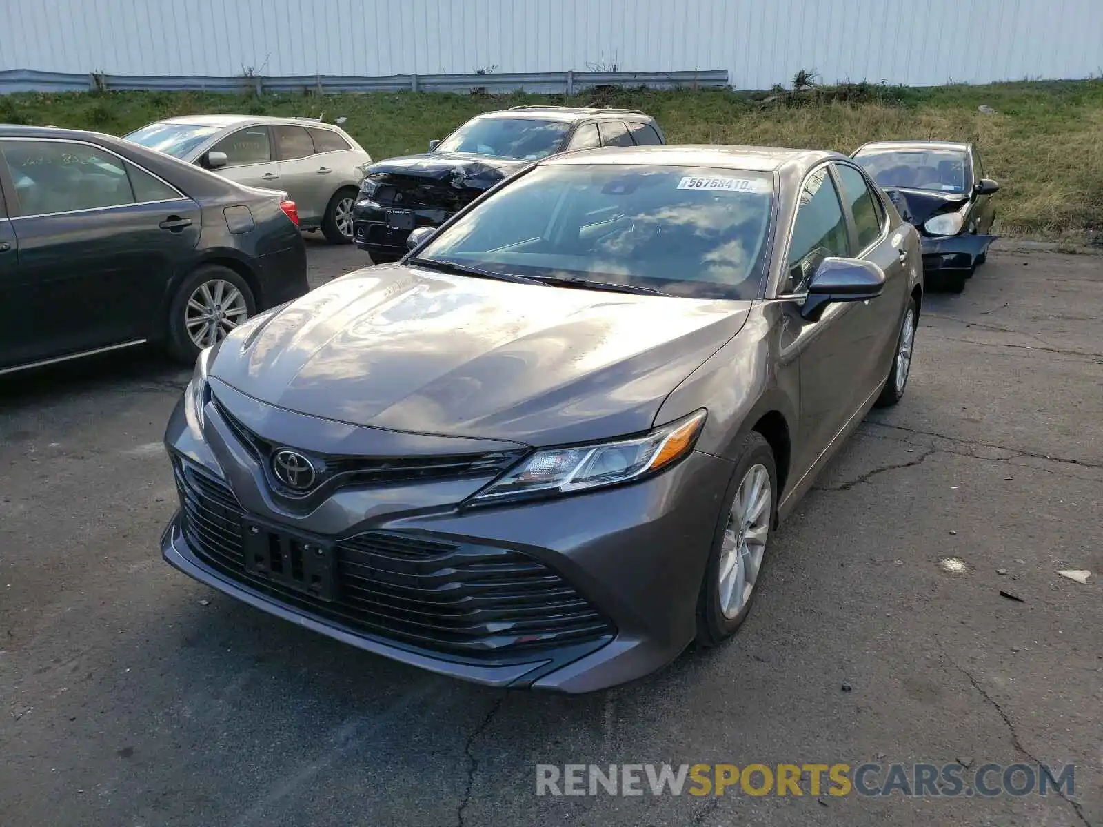 2 Photograph of a damaged car 4T1B11HK6KU290270 TOYOTA CAMRY 2019