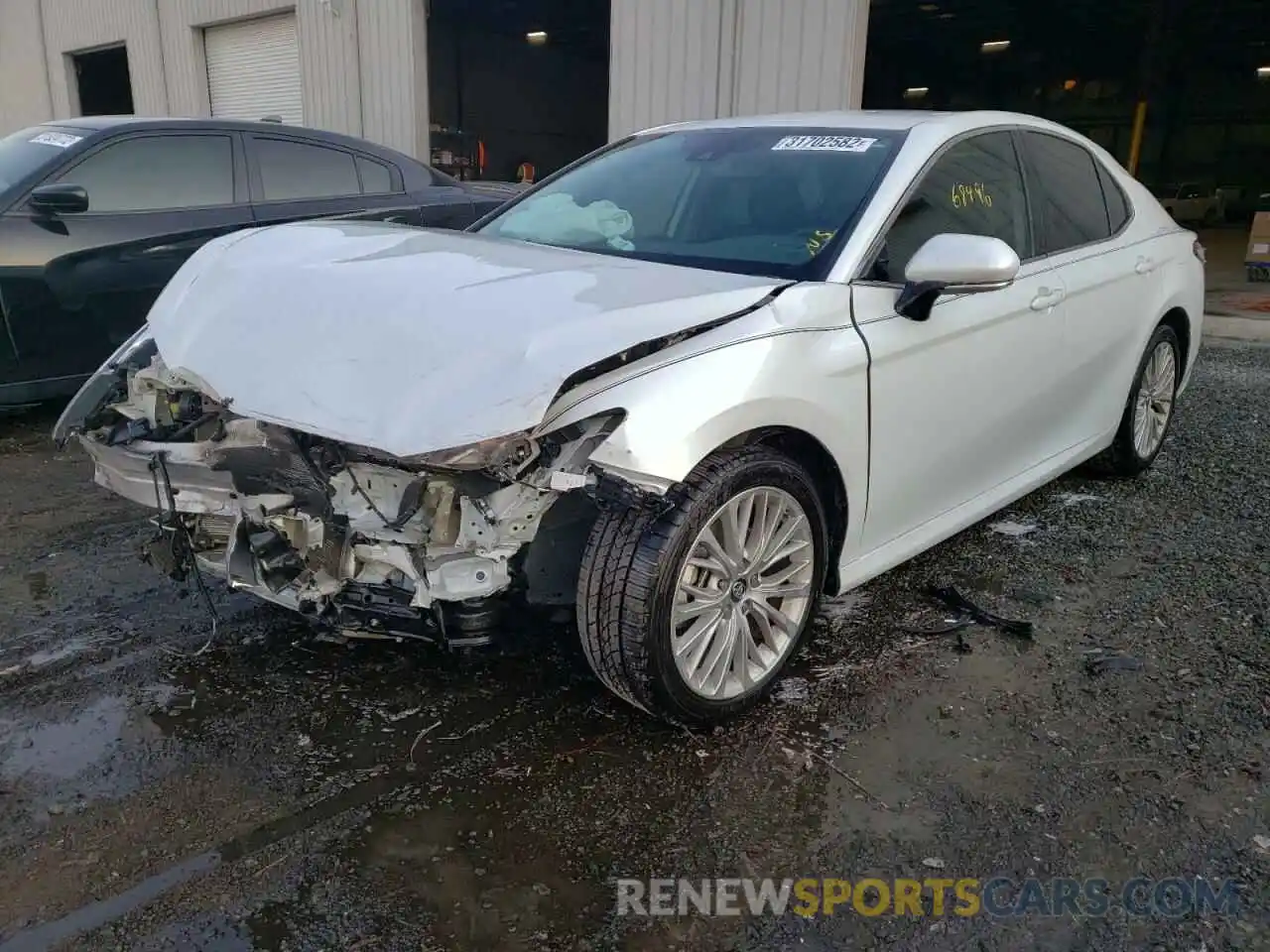 2 Photograph of a damaged car 4T1B11HK6KU293685 TOYOTA CAMRY 2019