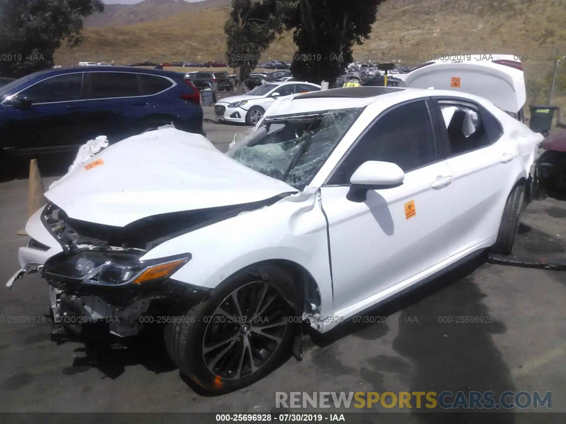 2 Photograph of a damaged car 4T1B11HK6KU679104 TOYOTA CAMRY 2019