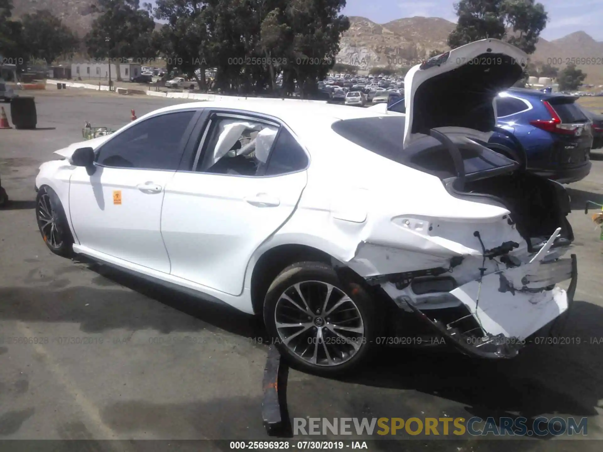 3 Photograph of a damaged car 4T1B11HK6KU679104 TOYOTA CAMRY 2019