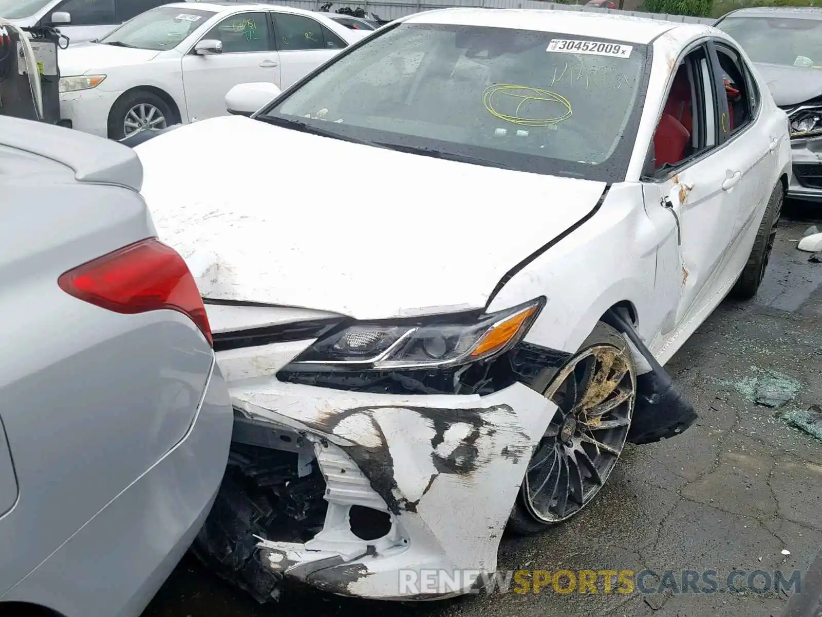 2 Photograph of a damaged car 4T1B11HK6KU679958 TOYOTA CAMRY 2019