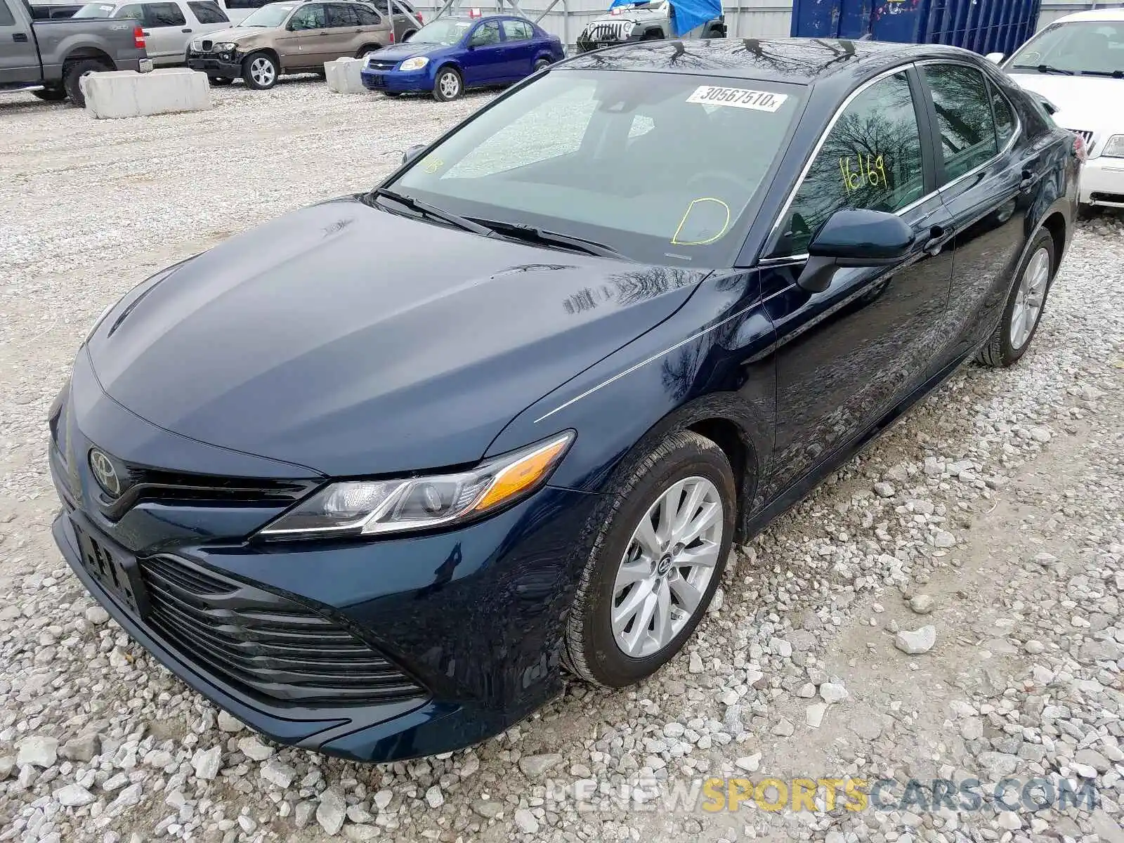 2 Photograph of a damaged car 4T1B11HK6KU681239 TOYOTA CAMRY 2019