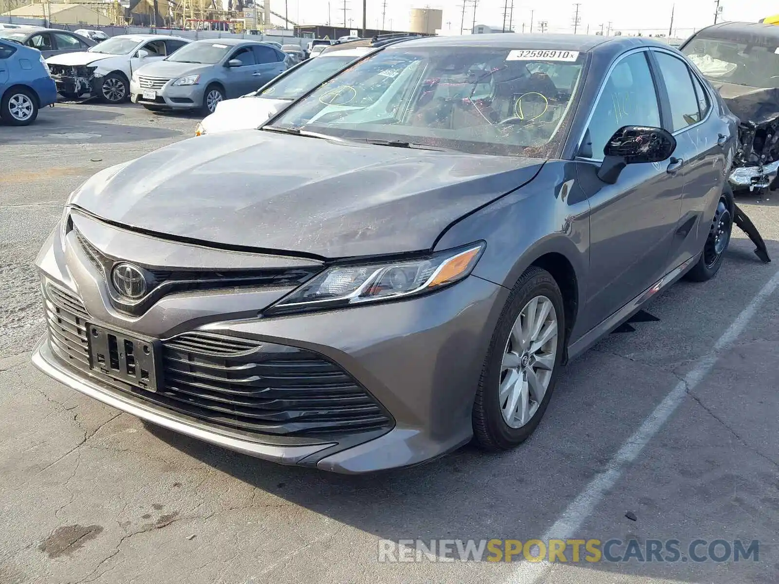 2 Photograph of a damaged car 4T1B11HK6KU682925 TOYOTA CAMRY 2019