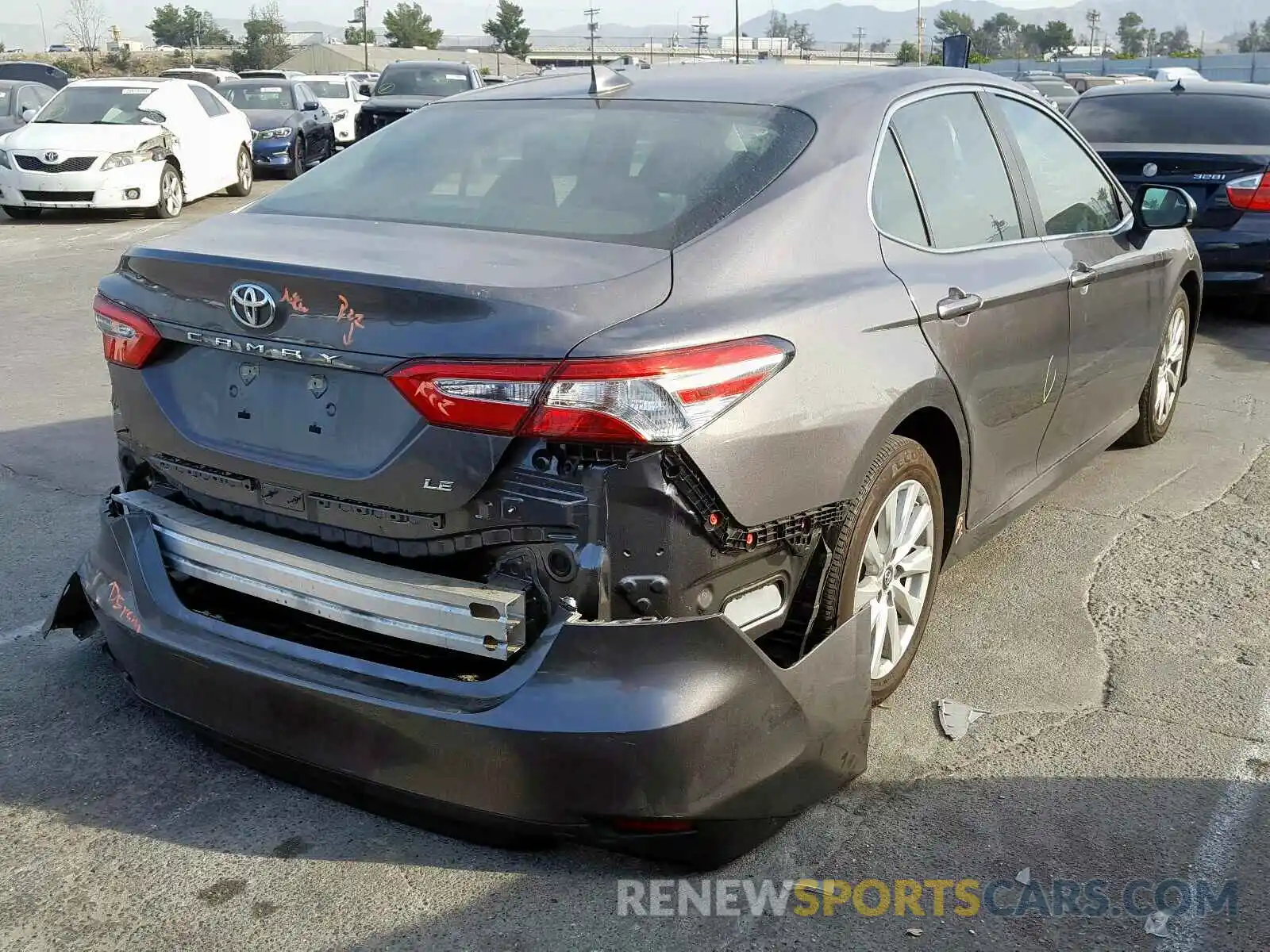 4 Photograph of a damaged car 4T1B11HK6KU682925 TOYOTA CAMRY 2019