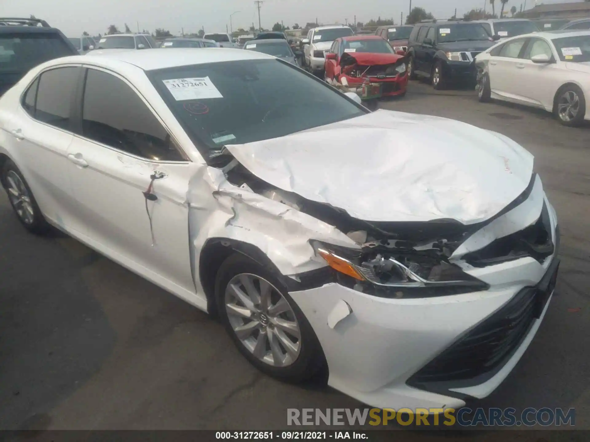 1 Photograph of a damaged car 4T1B11HK6KU684688 TOYOTA CAMRY 2019