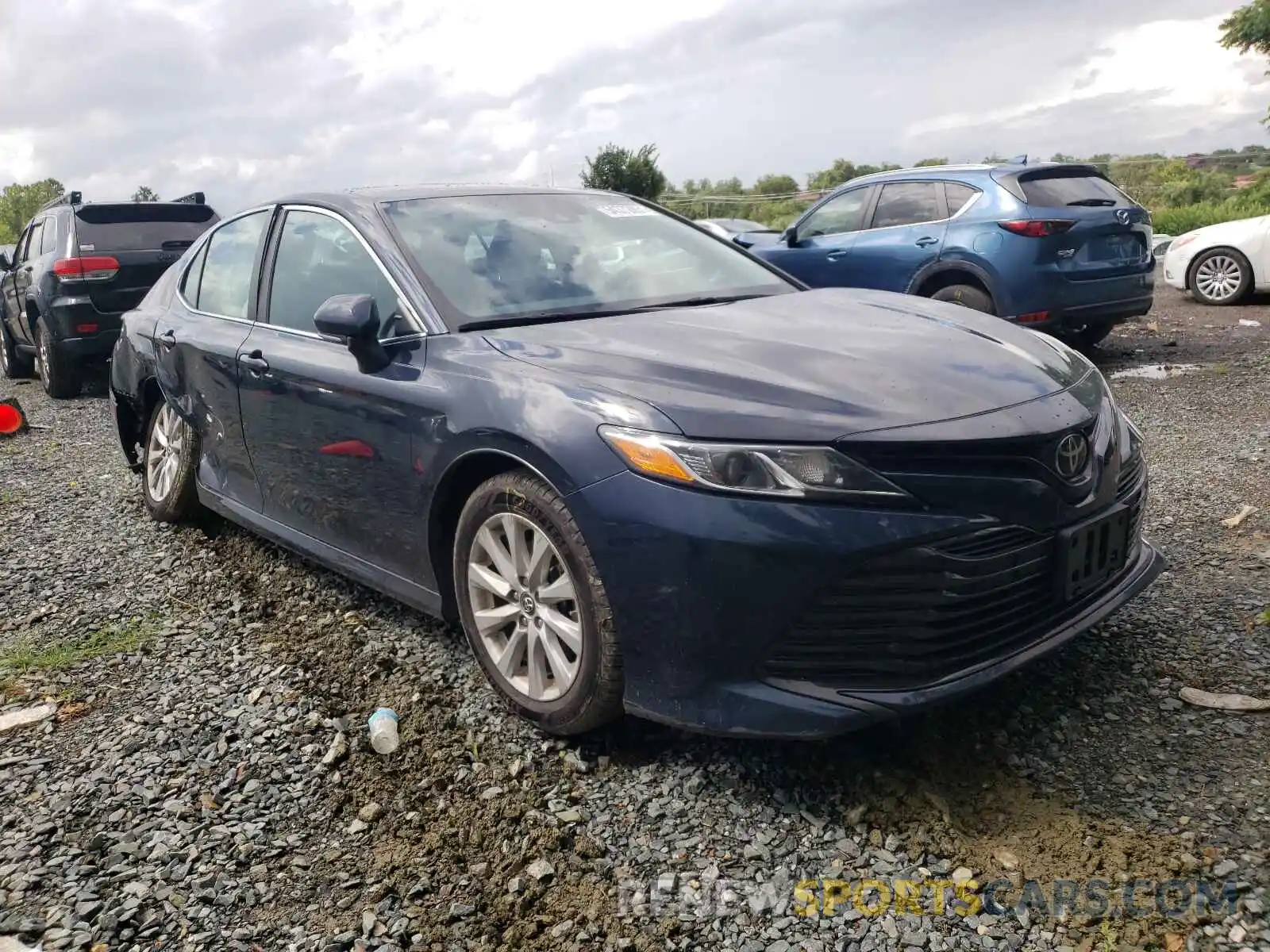 1 Photograph of a damaged car 4T1B11HK6KU684867 TOYOTA CAMRY 2019