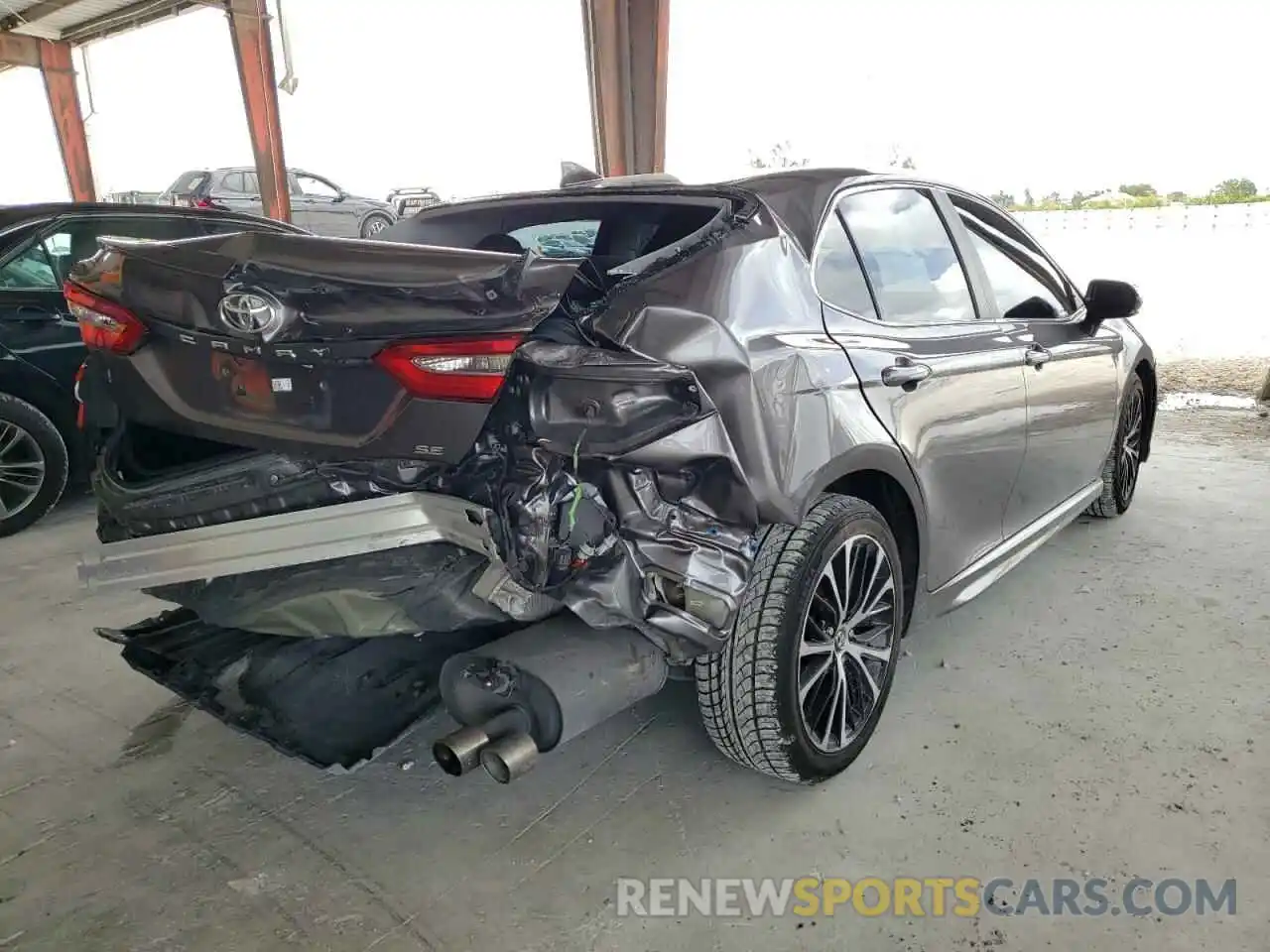 4 Photograph of a damaged car 4T1B11HK6KU686778 TOYOTA CAMRY 2019