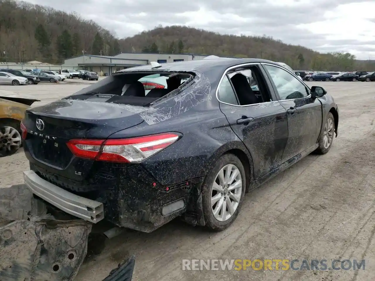 4 Photograph of a damaged car 4T1B11HK6KU687218 TOYOTA CAMRY 2019