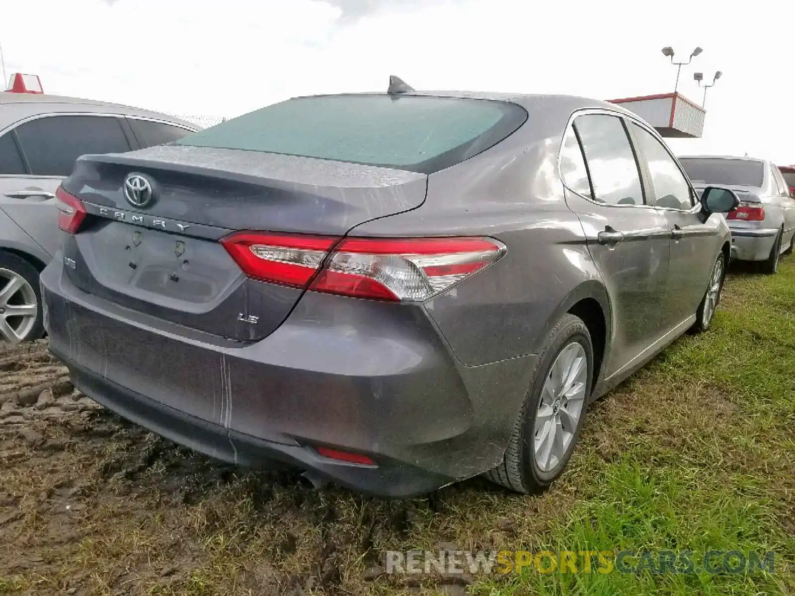 4 Photograph of a damaged car 4T1B11HK6KU689597 TOYOTA CAMRY 2019