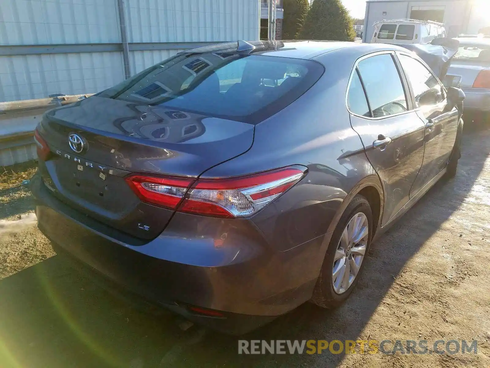 4 Photograph of a damaged car 4T1B11HK6KU693309 TOYOTA CAMRY 2019