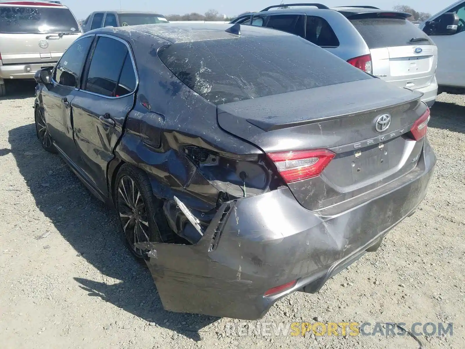 3 Photograph of a damaged car 4T1B11HK6KU693357 TOYOTA CAMRY 2019