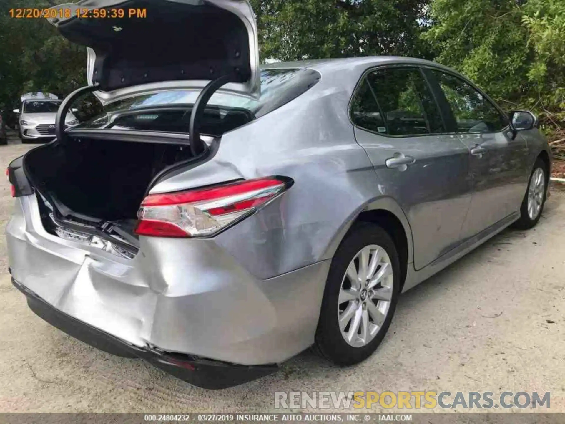 11 Photograph of a damaged car 4T1B11HK6KU694556 TOYOTA CAMRY 2019