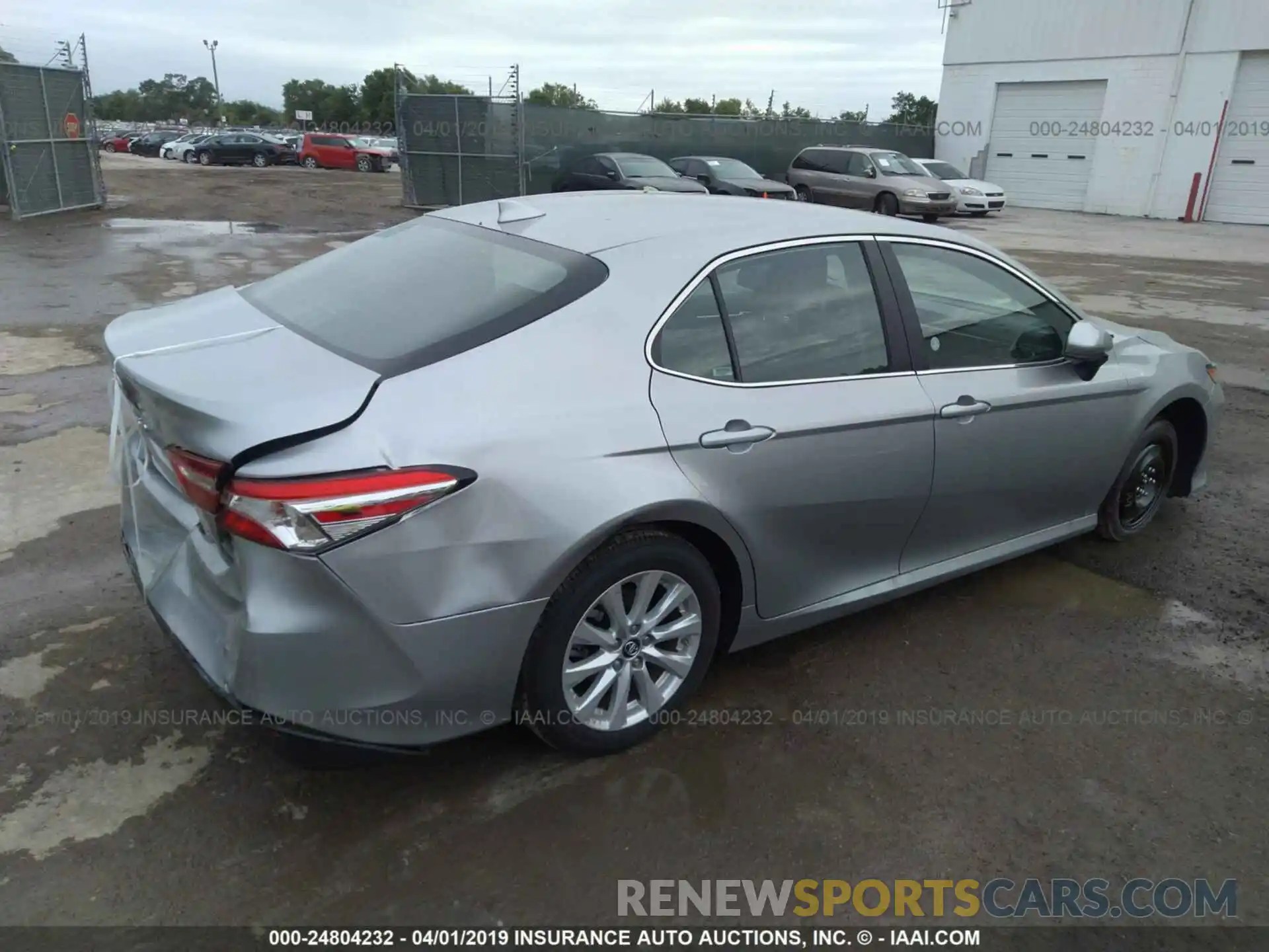 4 Photograph of a damaged car 4T1B11HK6KU694556 TOYOTA CAMRY 2019