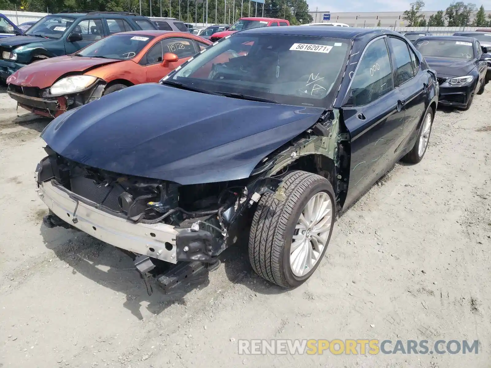 2 Photograph of a damaged car 4T1B11HK6KU696193 TOYOTA CAMRY 2019