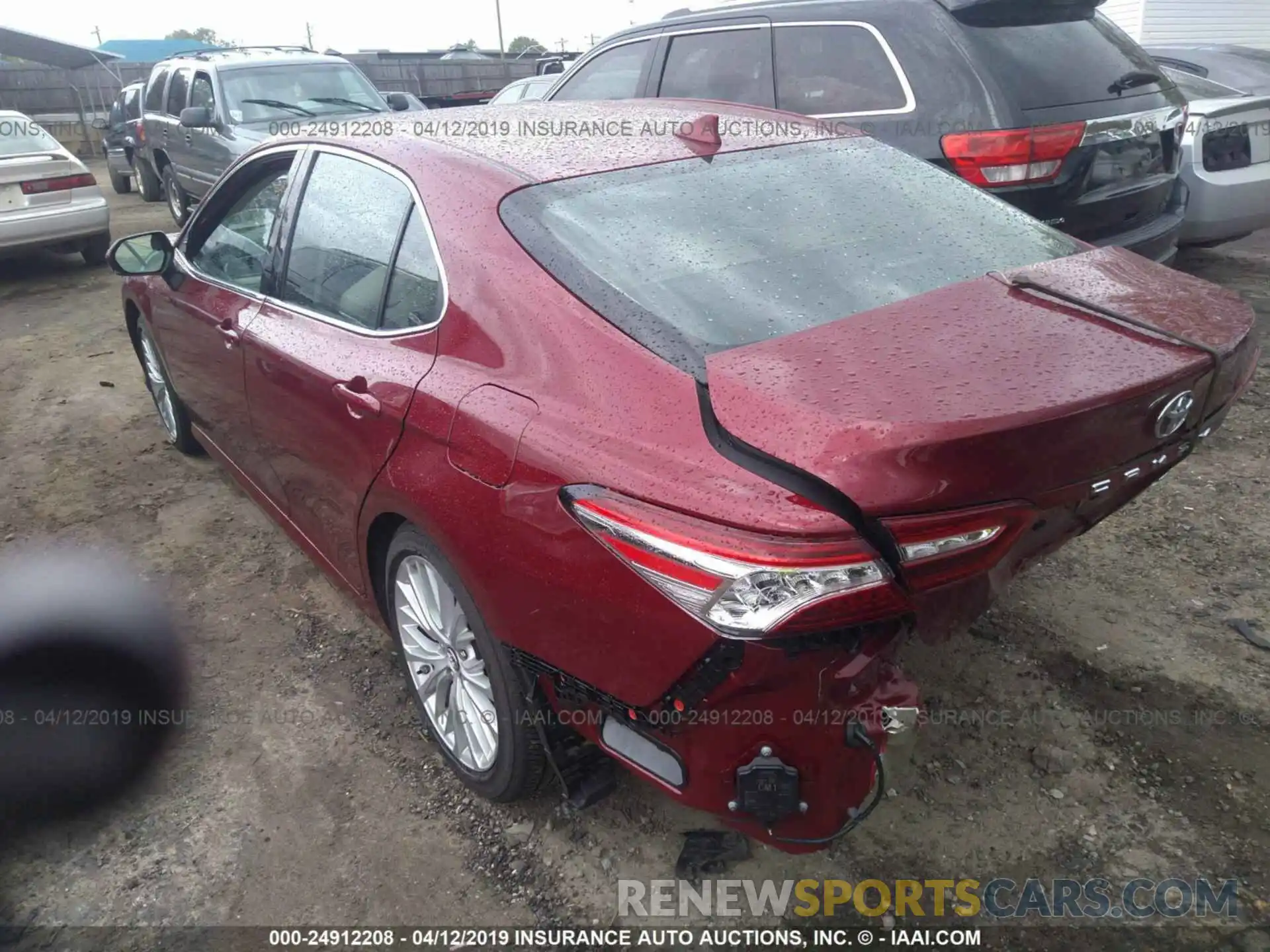 3 Photograph of a damaged car 4T1B11HK6KU697974 TOYOTA CAMRY 2019