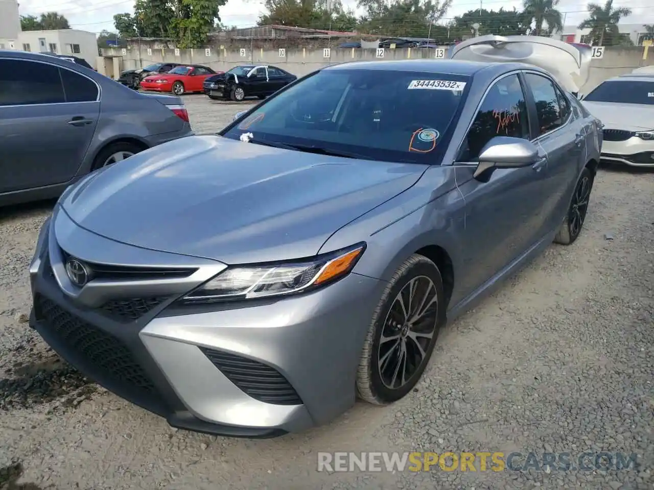 2 Photograph of a damaged car 4T1B11HK6KU700419 TOYOTA CAMRY 2019