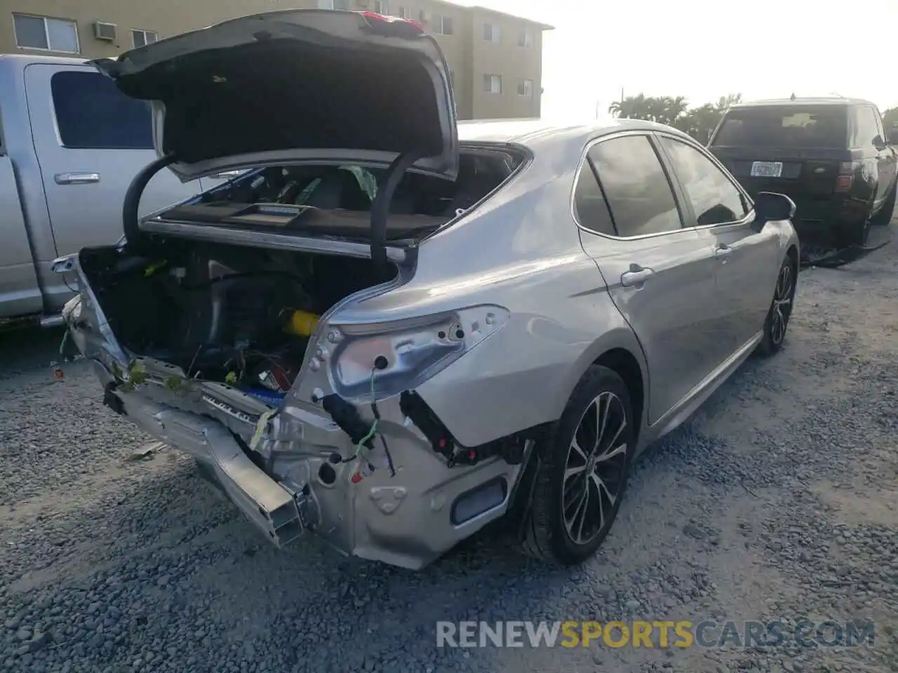 4 Photograph of a damaged car 4T1B11HK6KU700419 TOYOTA CAMRY 2019