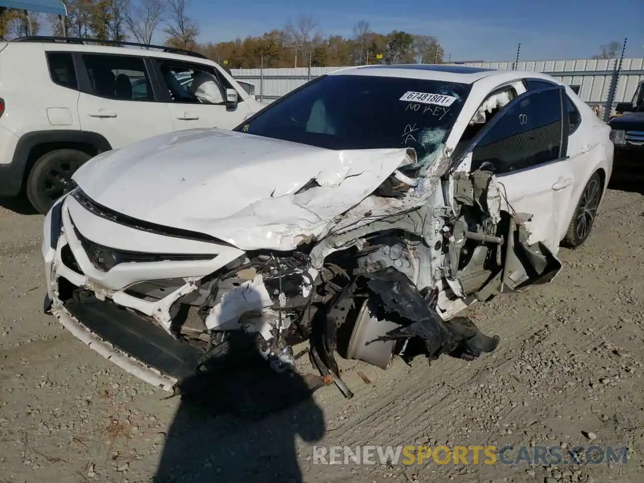 2 Photograph of a damaged car 4T1B11HK6KU701604 TOYOTA CAMRY 2019