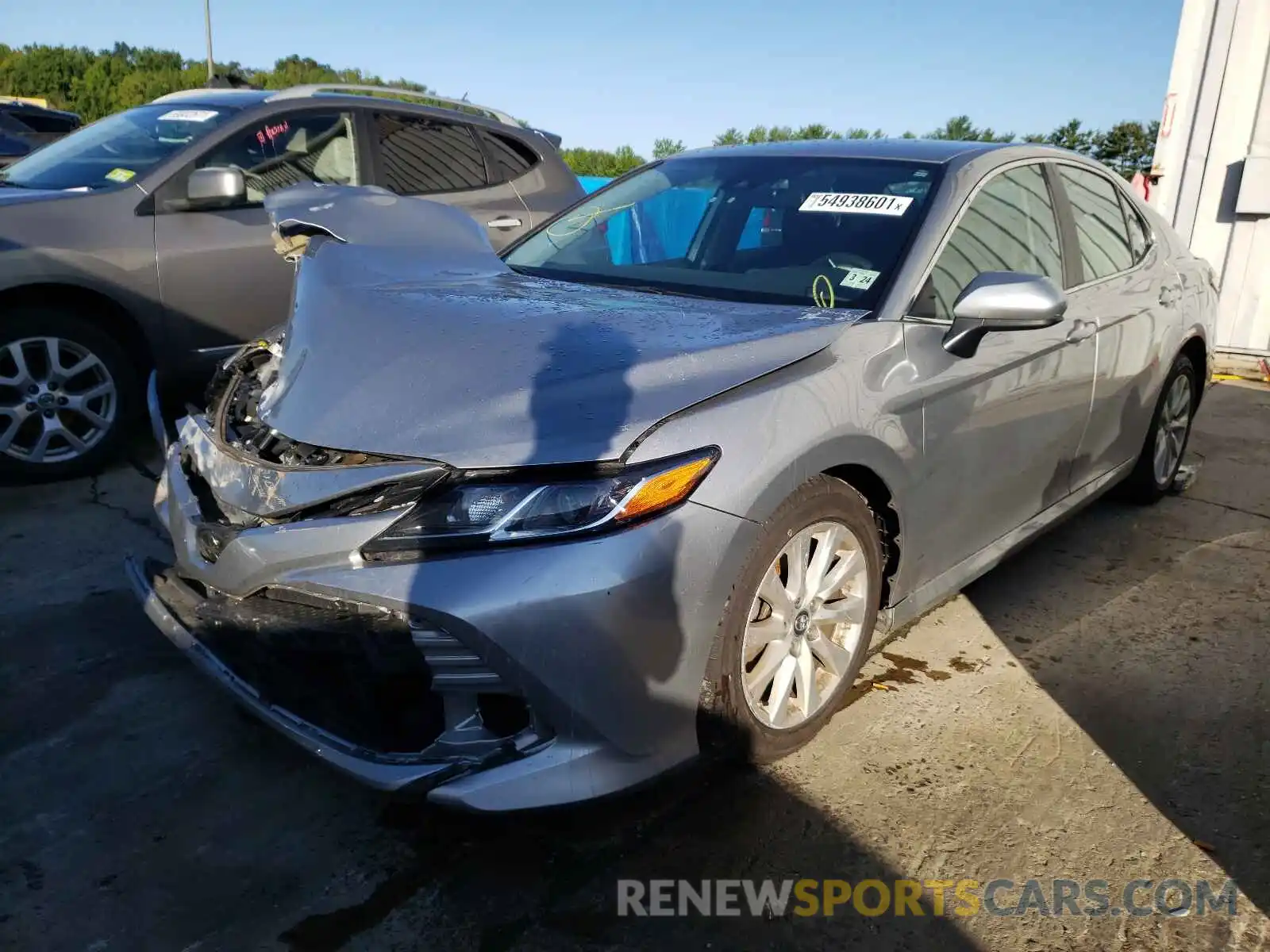 2 Photograph of a damaged car 4T1B11HK6KU702235 TOYOTA CAMRY 2019