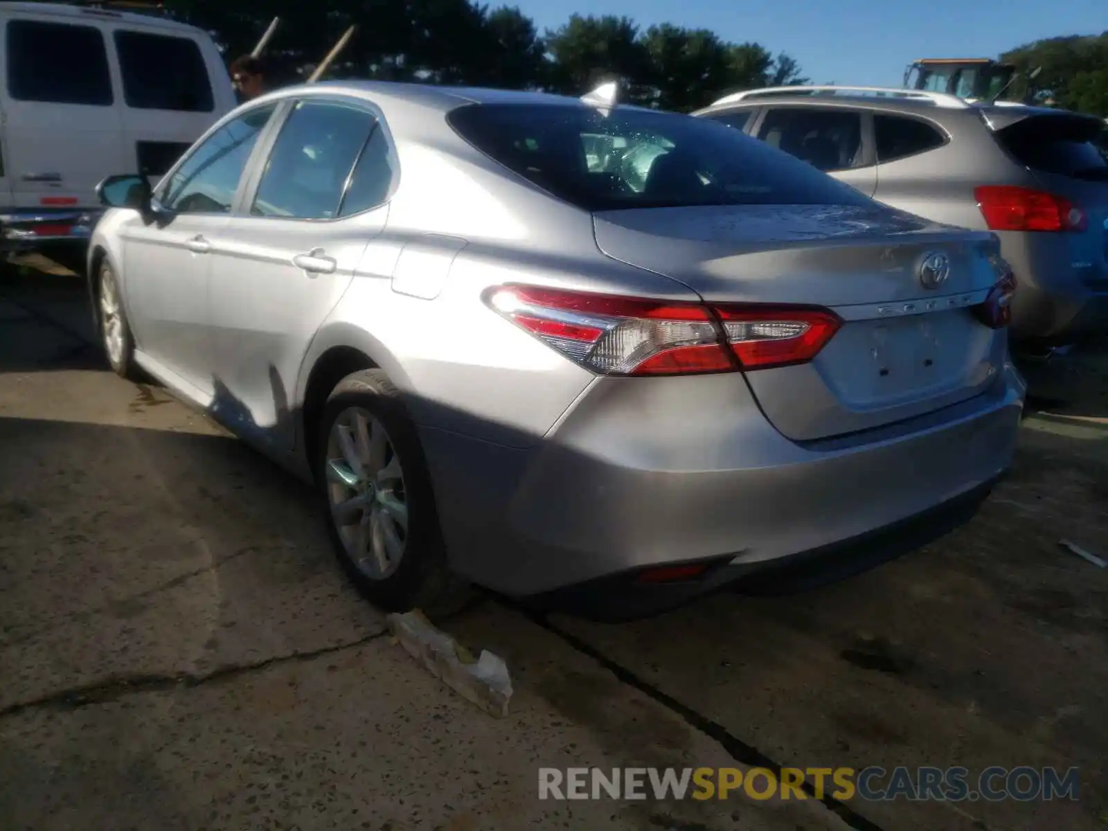 3 Photograph of a damaged car 4T1B11HK6KU702235 TOYOTA CAMRY 2019