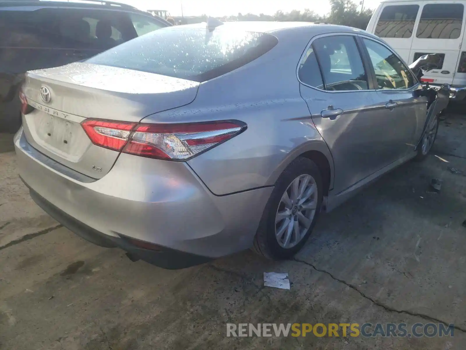 4 Photograph of a damaged car 4T1B11HK6KU702235 TOYOTA CAMRY 2019