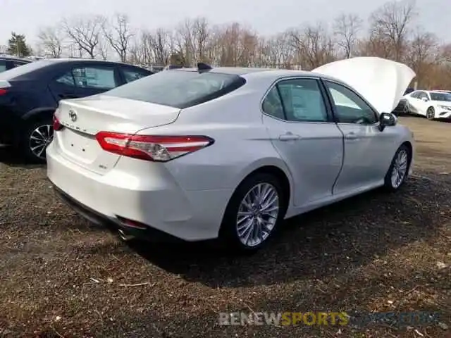 3 Photograph of a damaged car 4T1B11HK6KU703353 TOYOTA CAMRY 2019