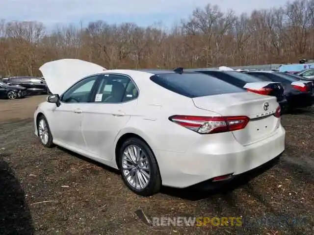 4 Photograph of a damaged car 4T1B11HK6KU703353 TOYOTA CAMRY 2019