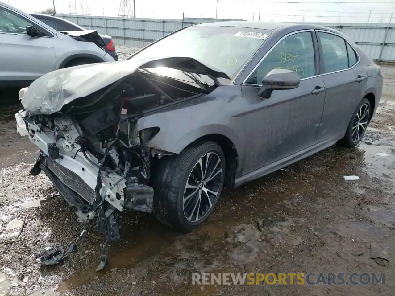 2 Photograph of a damaged car 4T1B11HK6KU703854 TOYOTA CAMRY 2019