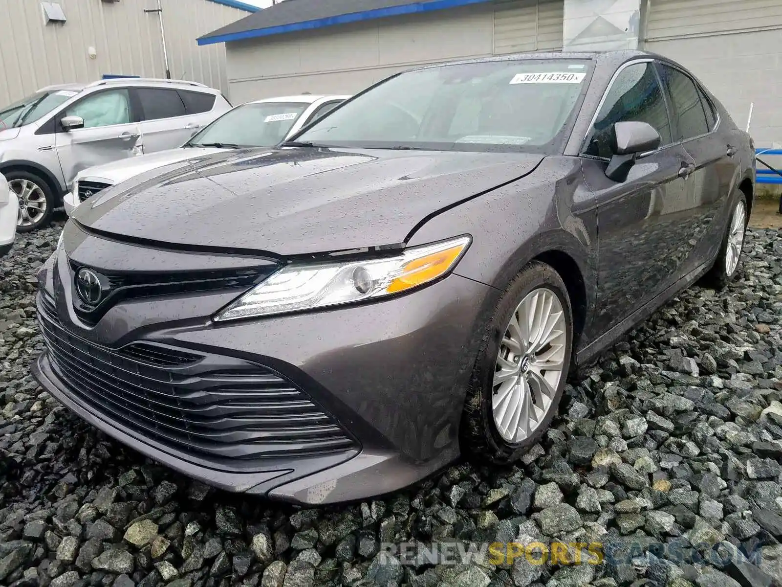 2 Photograph of a damaged car 4T1B11HK6KU703921 TOYOTA CAMRY 2019