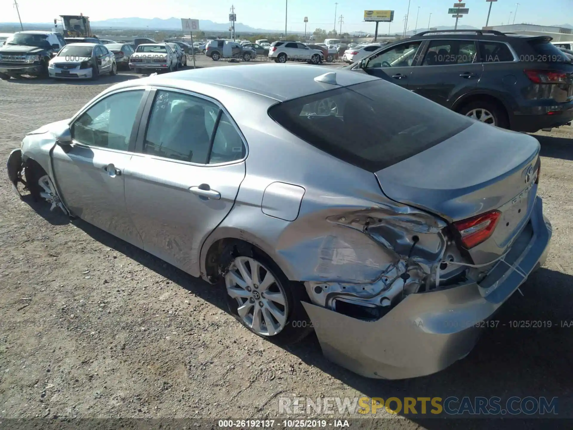 3 Photograph of a damaged car 4T1B11HK6KU705054 TOYOTA CAMRY 2019