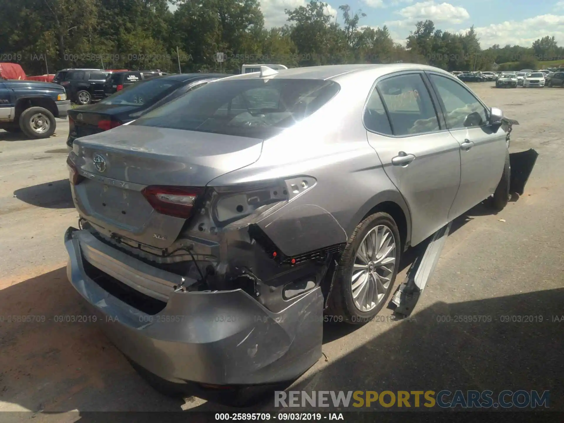 4 Photograph of a damaged car 4T1B11HK6KU706785 TOYOTA CAMRY 2019