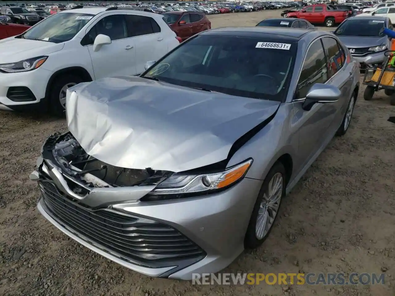 2 Photograph of a damaged car 4T1B11HK6KU708827 TOYOTA CAMRY 2019