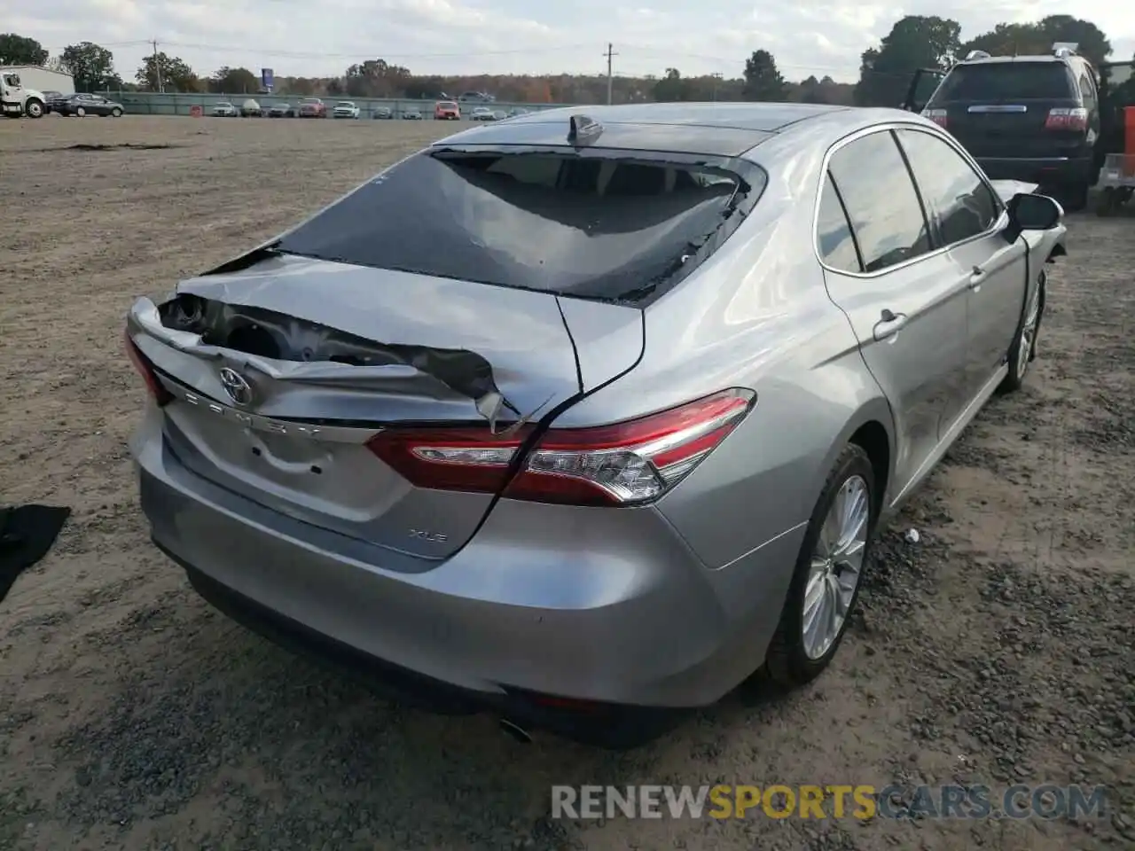 4 Photograph of a damaged car 4T1B11HK6KU708827 TOYOTA CAMRY 2019