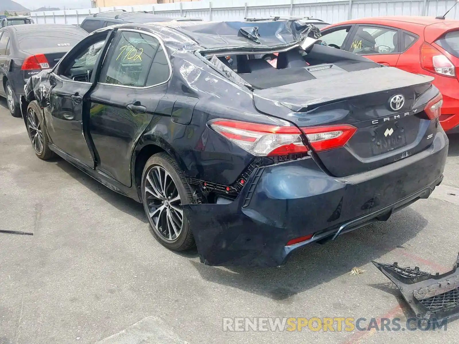 3 Photograph of a damaged car 4T1B11HK6KU709797 TOYOTA CAMRY 2019