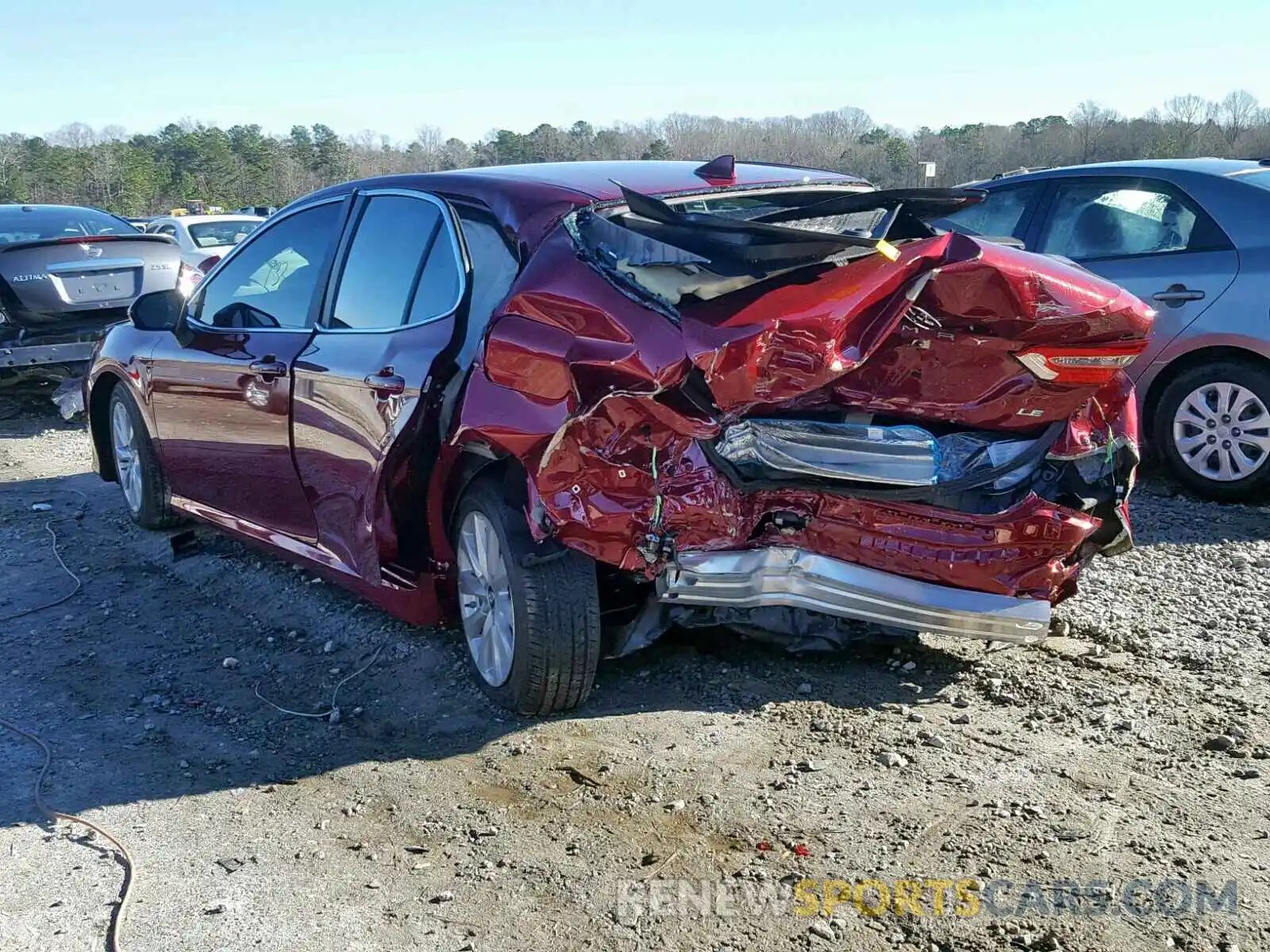 3 Photograph of a damaged car 4T1B11HK6KU710609 TOYOTA CAMRY 2019