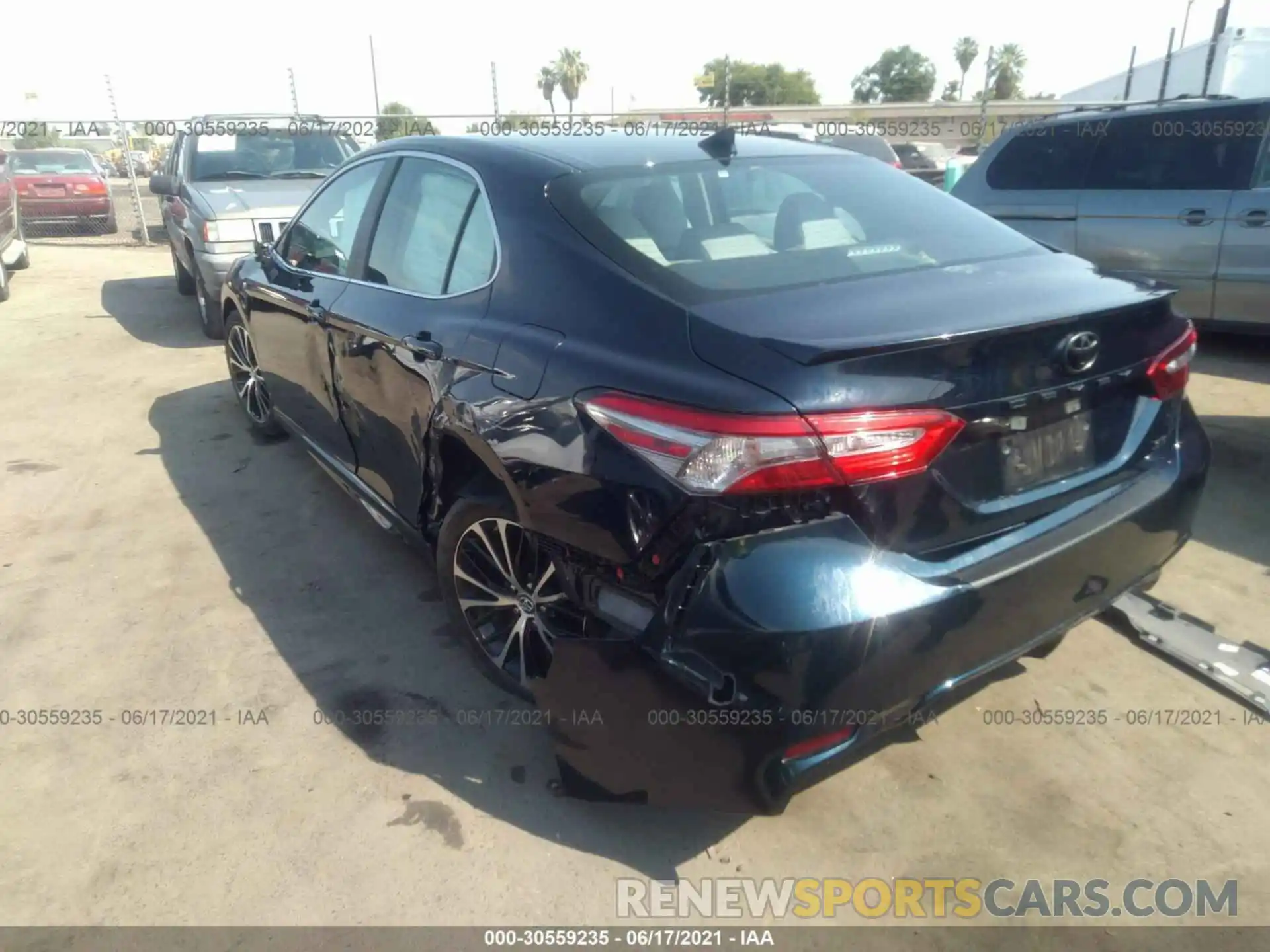 3 Photograph of a damaged car 4T1B11HK6KU712330 TOYOTA CAMRY 2019