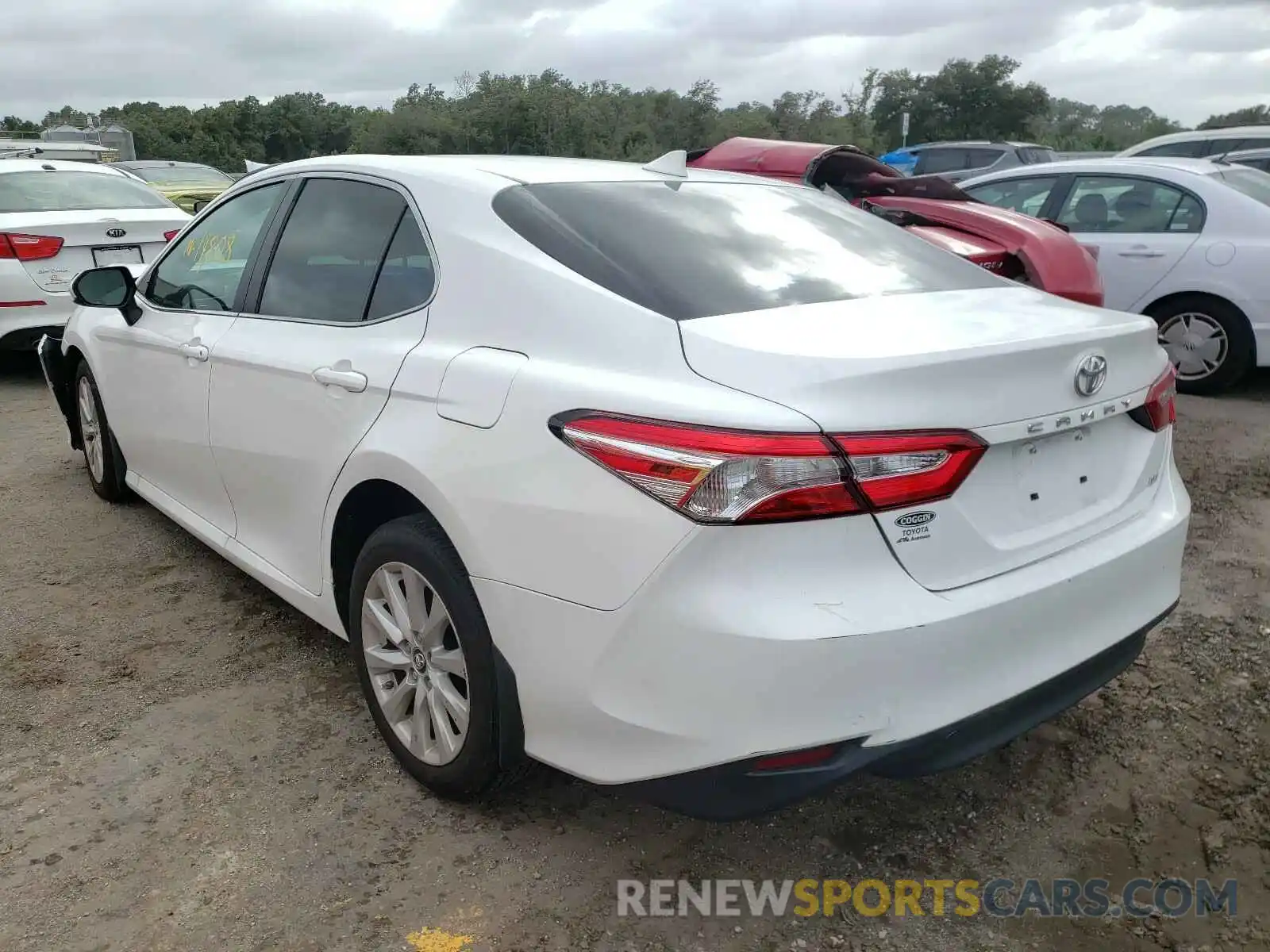 3 Photograph of a damaged car 4T1B11HK6KU712716 TOYOTA CAMRY 2019