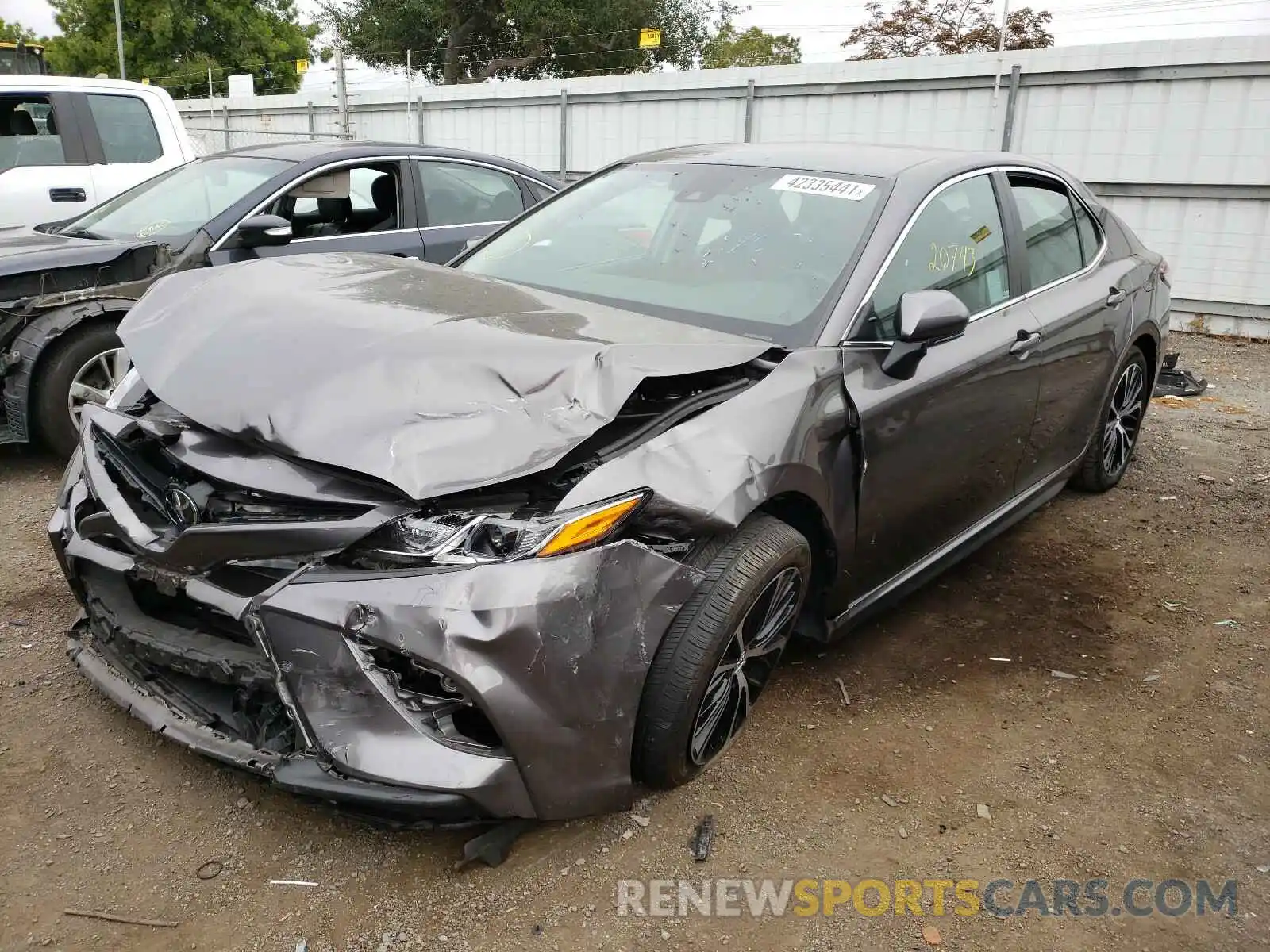 2 Photograph of a damaged car 4T1B11HK6KU713719 TOYOTA CAMRY 2019