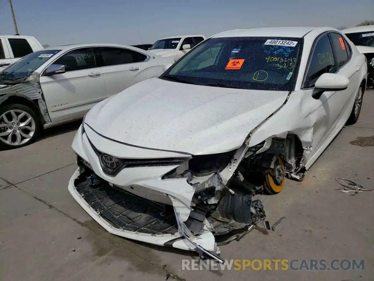 2 Photograph of a damaged car 4T1B11HK6KU714112 TOYOTA CAMRY 2019