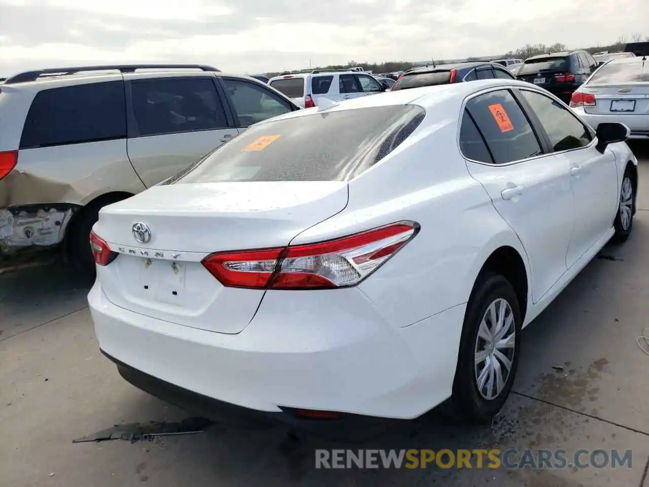 4 Photograph of a damaged car 4T1B11HK6KU714112 TOYOTA CAMRY 2019