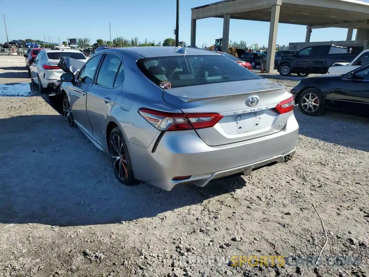 3 Photograph of a damaged car 4T1B11HK6KU715194 TOYOTA CAMRY 2019