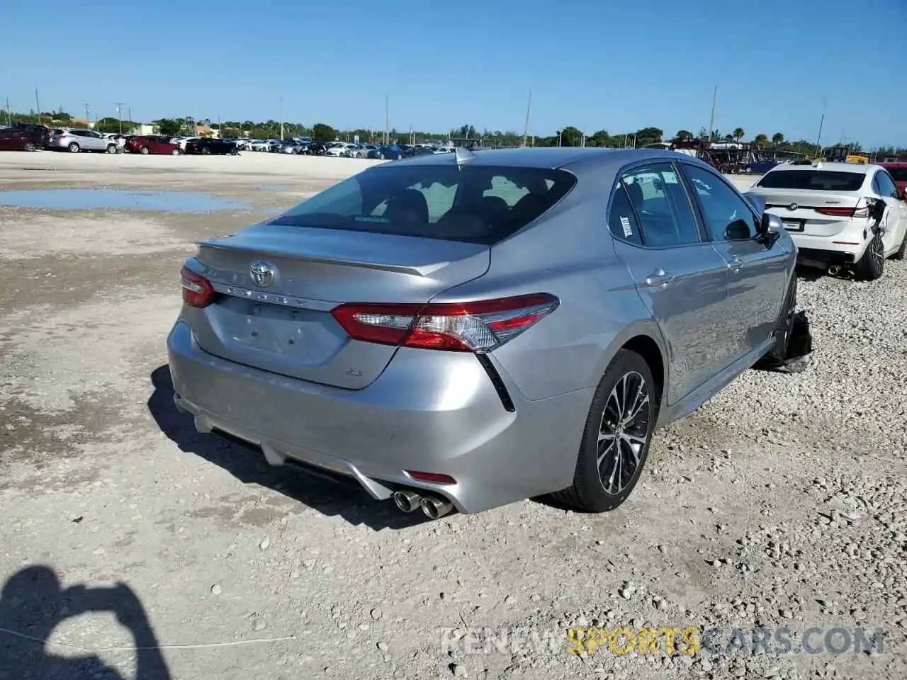 4 Photograph of a damaged car 4T1B11HK6KU715194 TOYOTA CAMRY 2019