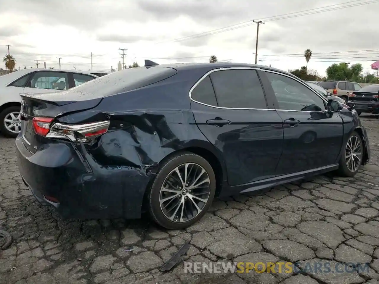 3 Photograph of a damaged car 4T1B11HK6KU717821 TOYOTA CAMRY 2019