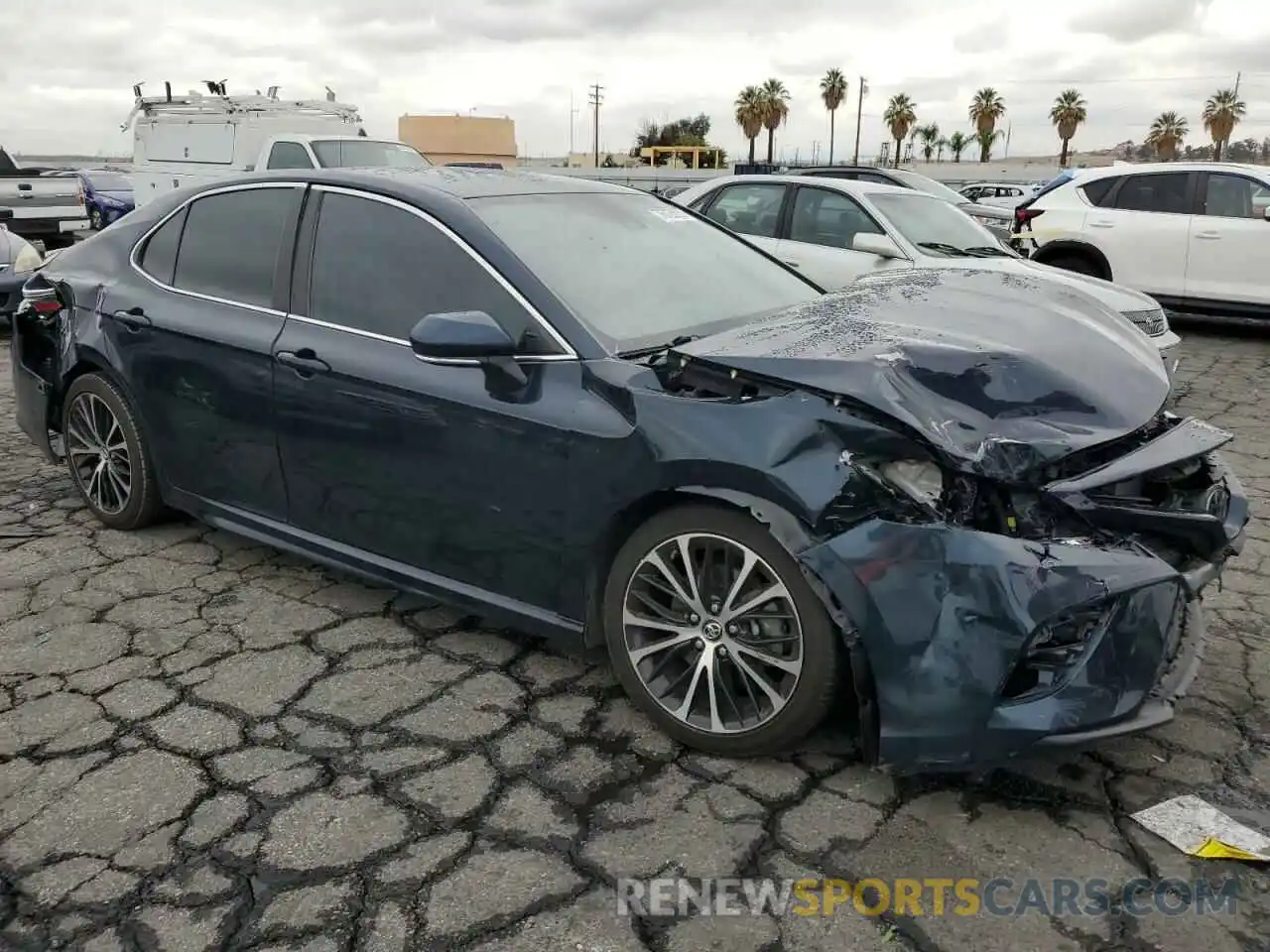 4 Photograph of a damaged car 4T1B11HK6KU717821 TOYOTA CAMRY 2019