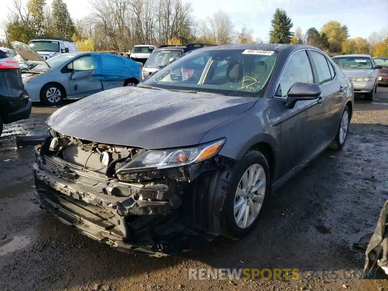 2 Photograph of a damaged car 4T1B11HK6KU717835 TOYOTA CAMRY 2019